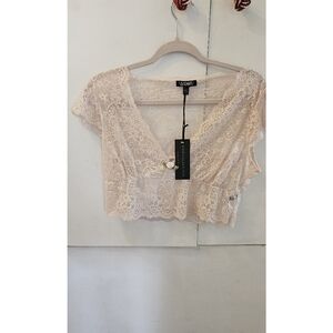 Dolls Kill Widow pink crop top